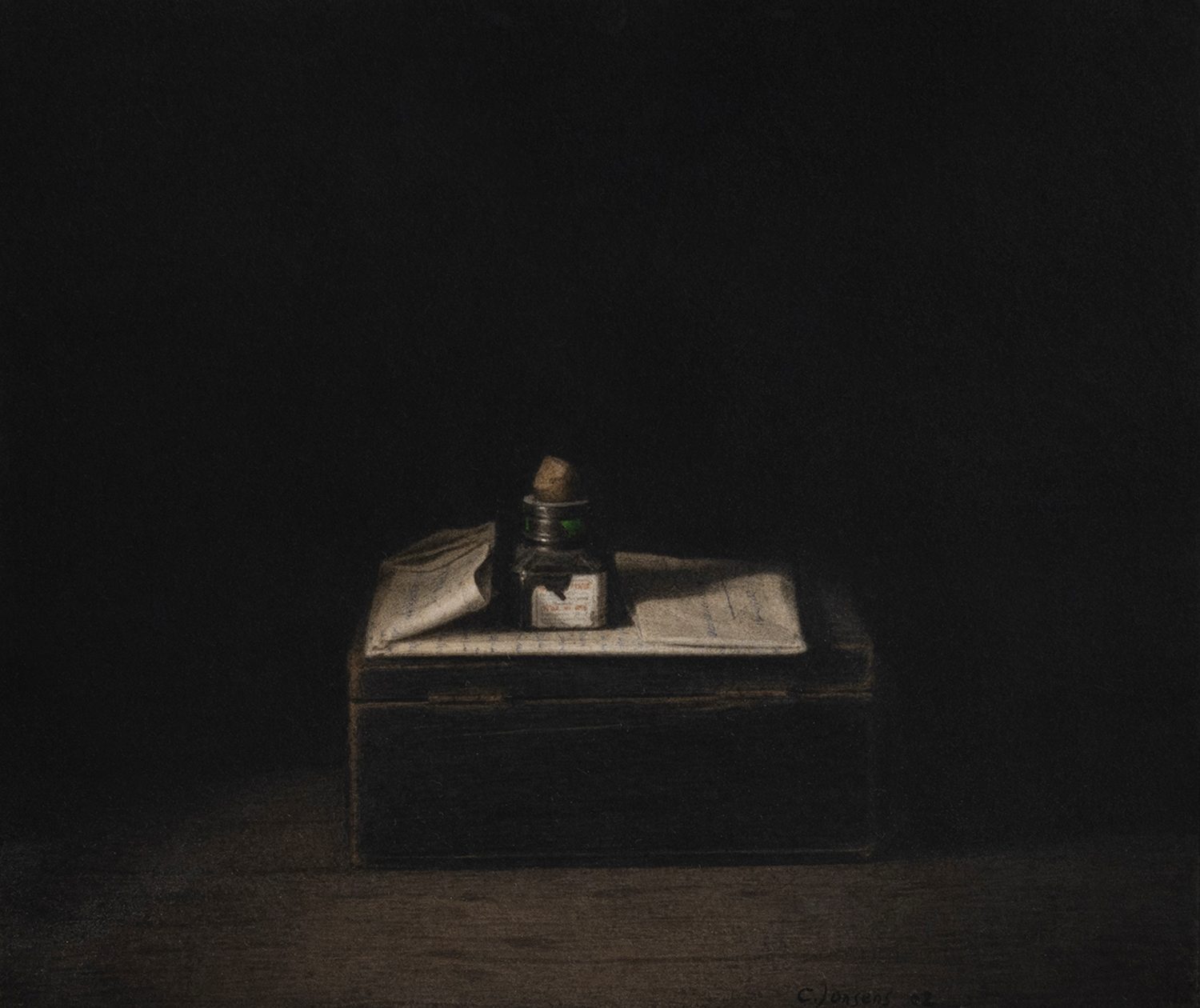 Petite Bouteille D'encre Dans Papier Plié